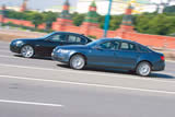        BMW 545i.  Audi A6 4.2 quattro    